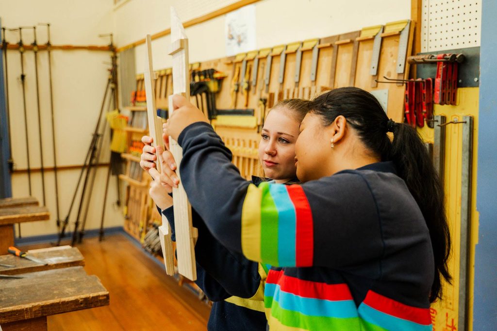 Girls in woodworking class